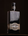 Garrafa Cabra Lab Licor de Café 750 ml em fundo preto — cold brew